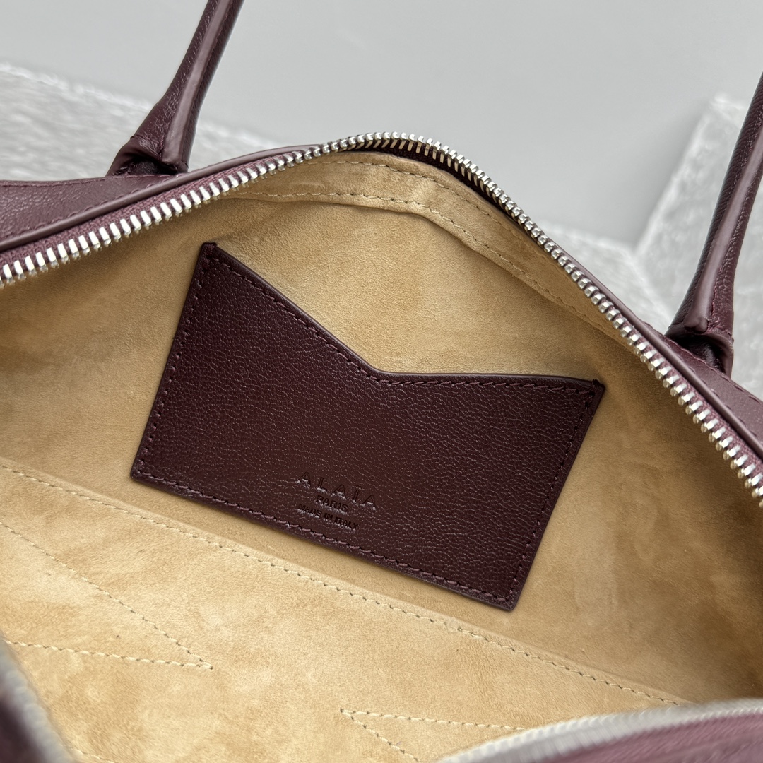 Alaïa Burgundy Small Le Teckel Shoulder Bag in LeatherAlaia  000613