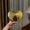 Alaïa Gold Le Coeur heart bag Golden Metal ref