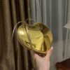 Alaïa Gold Le Coeur heart bag Golden Metal ref