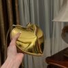 Alaïa Gold Le Coeur heart bag Golden Metal ref