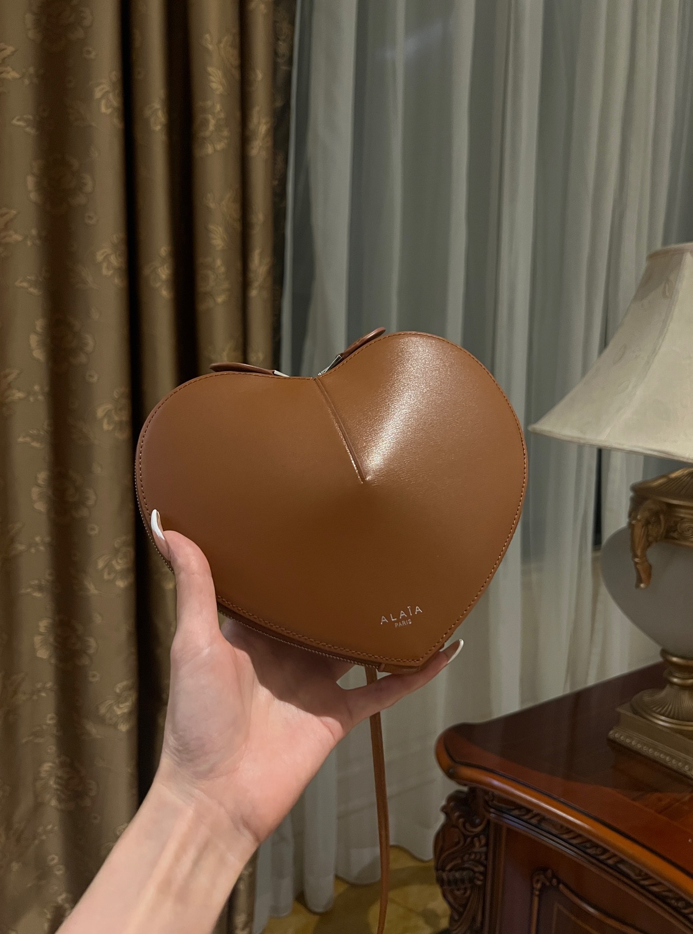 Le coeur leather crossbody bag Alaïa brown  in Leather