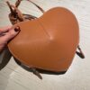 Le coeur leather crossbody bag Alaïa brown in Leather