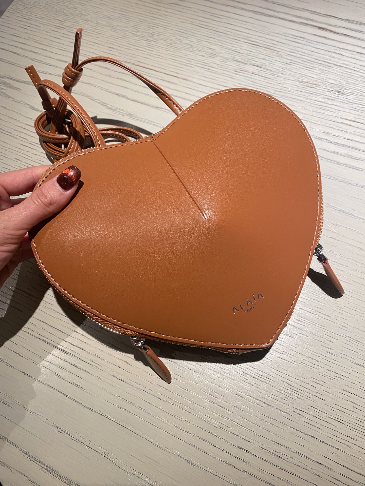 Le coeur leather crossbody bag Alaïa brown in Leather