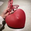 Le coeur leather crossbody bag Alaïa red in Leather