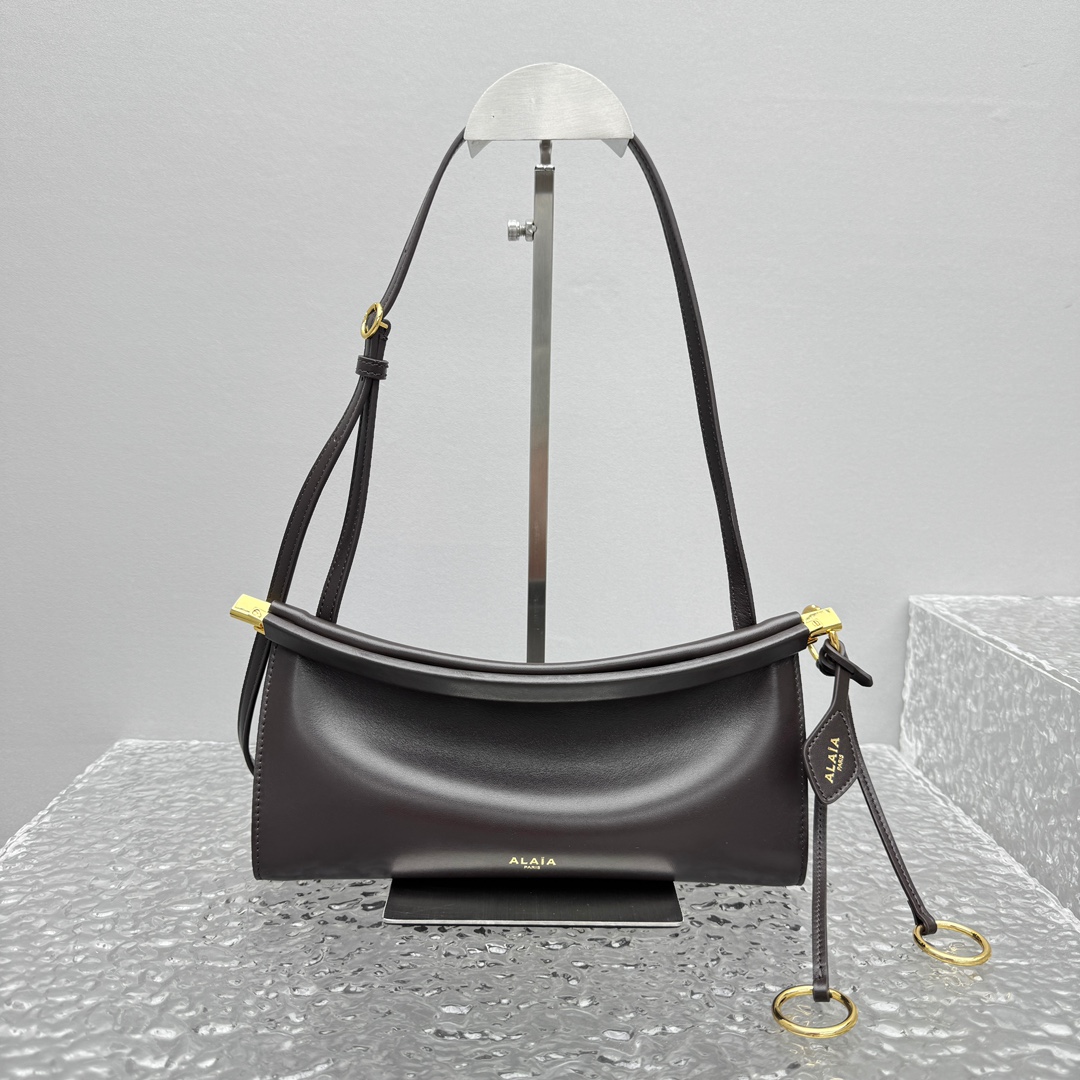 Alaïa Small Le Click East West Shoulder Bag in Black