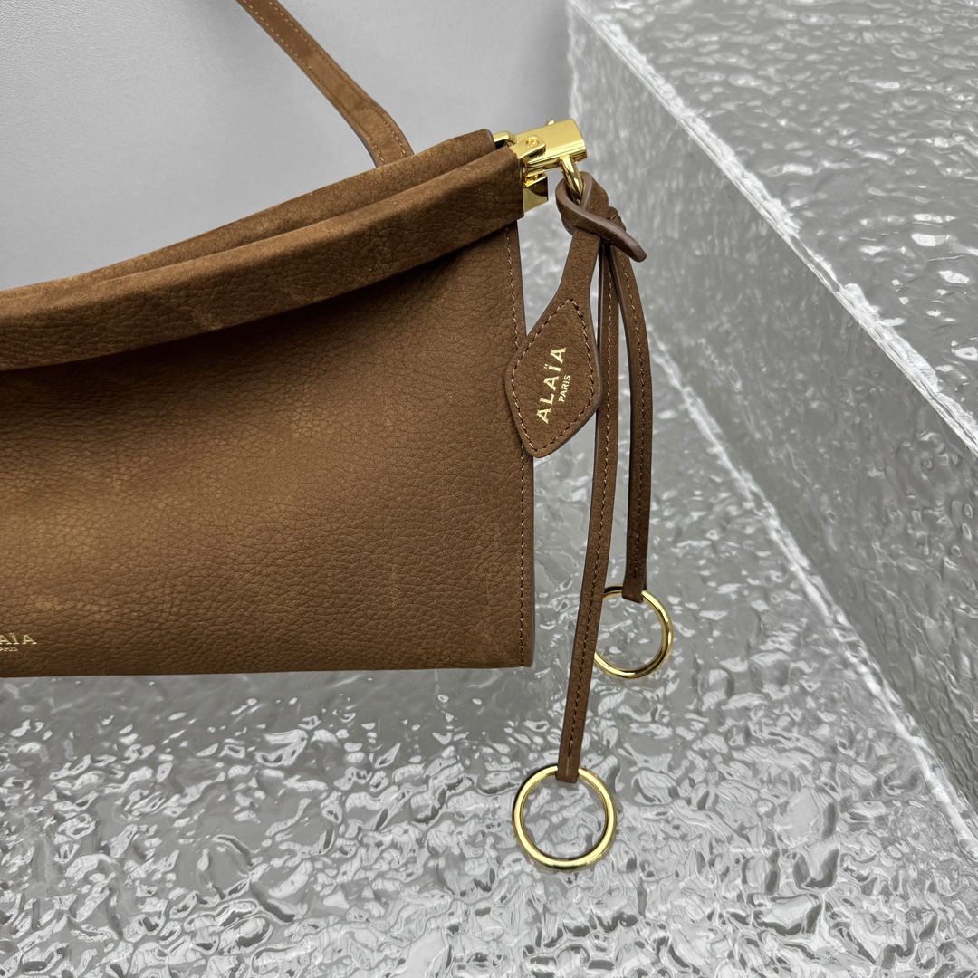 ALAIA Nubuck Medium Le Click East West Bag Umber 1621147
