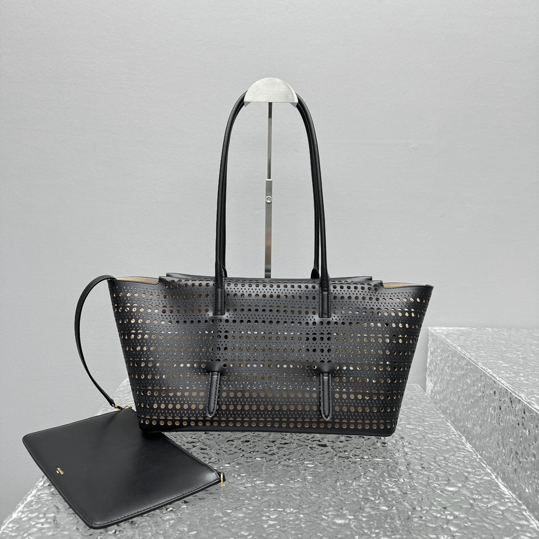 ALAÏA New Mina 32 laser-cut leather shoulder bag |