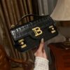 Balmain - B-BUZZ 24 black leather bag with metal logo