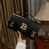 Balmain - B-BUZZ 24 black leather bag with metal logo