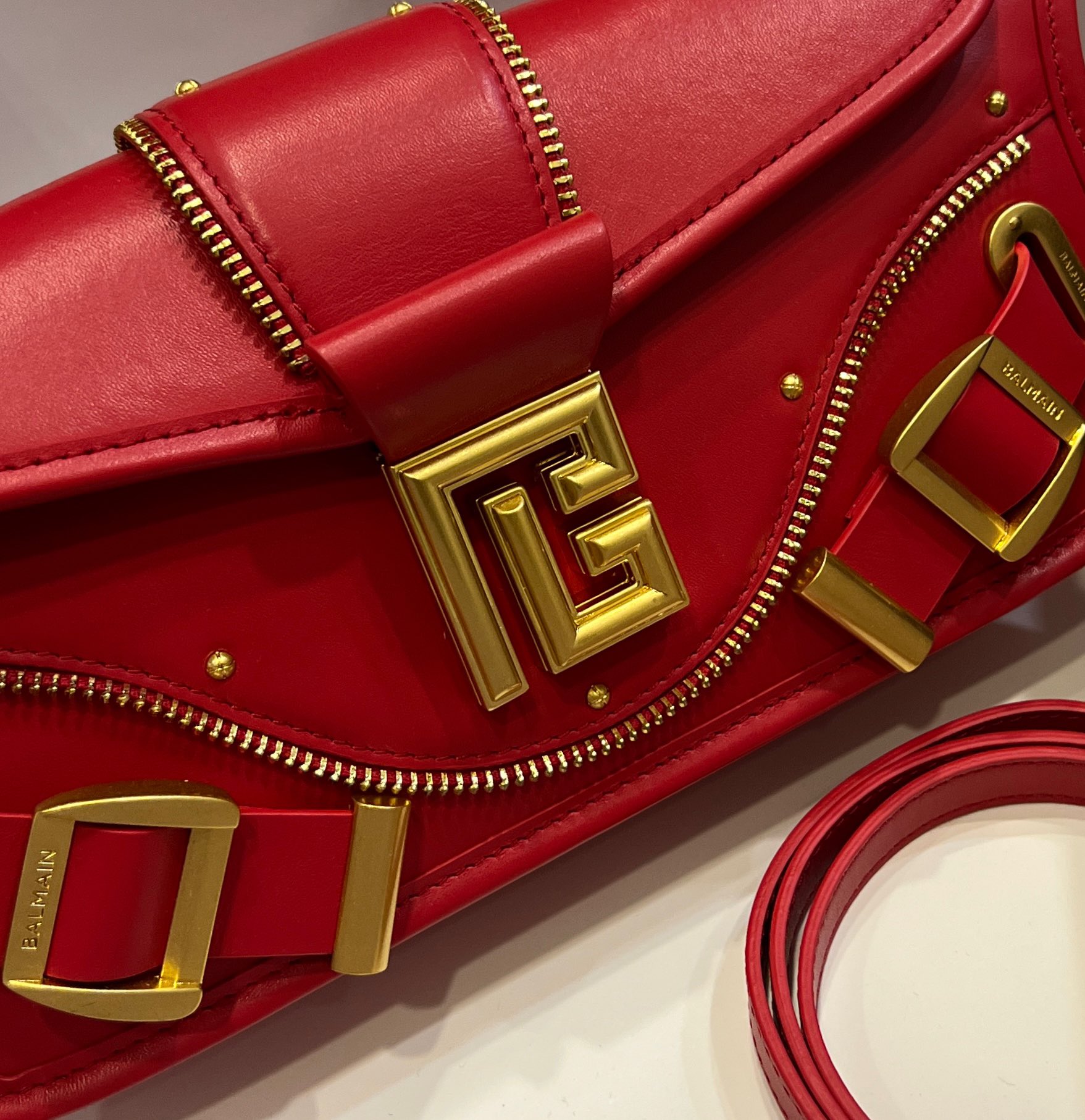 Balmain - Blaze red leather baguette bag with metal logo