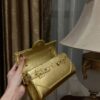 Buy Balmain gold B-Buzz 19 Baguette Bag in Metallic