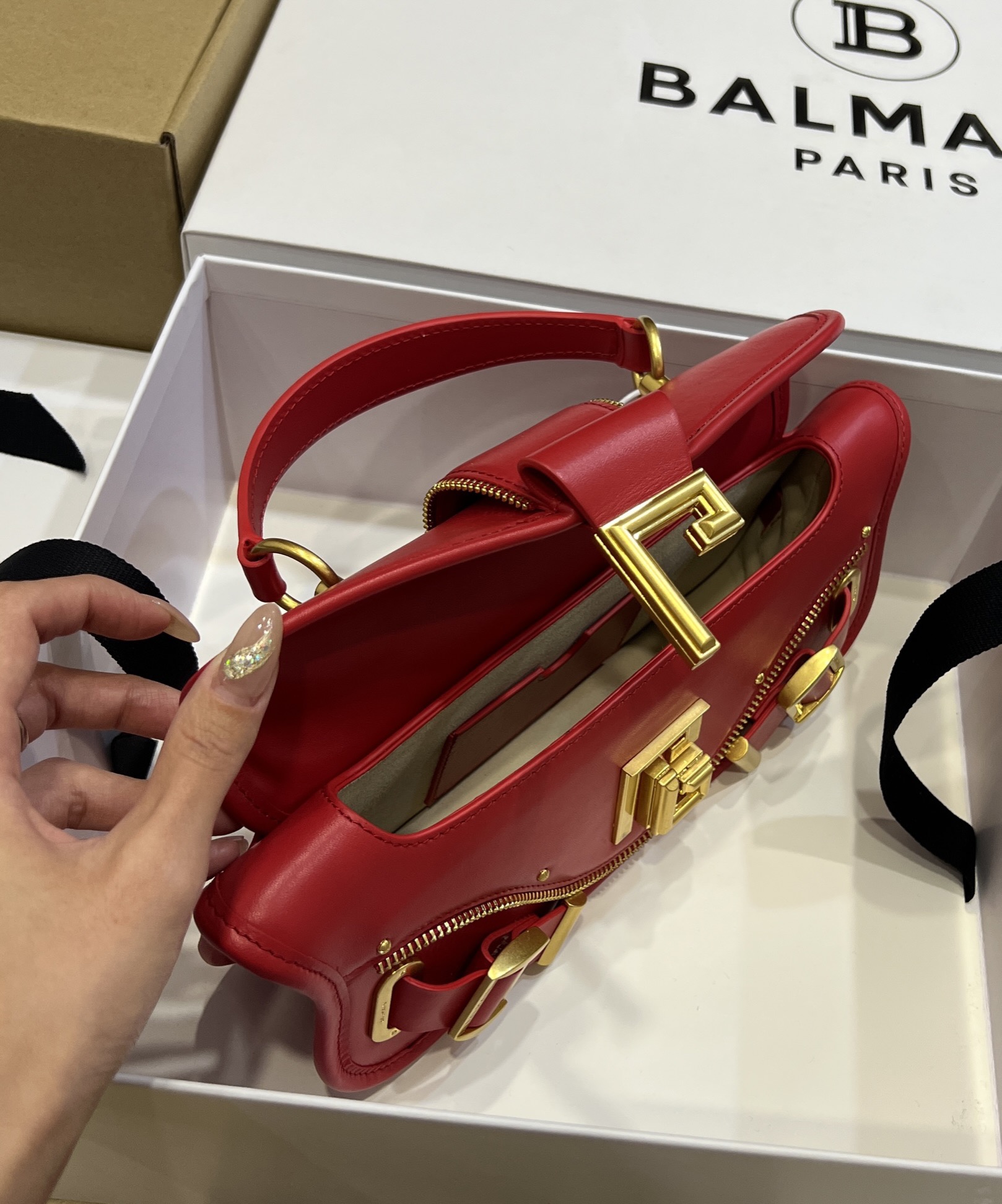 Balmain - Blaze red leather baguette bag with metal logo AN1AE795LSLX