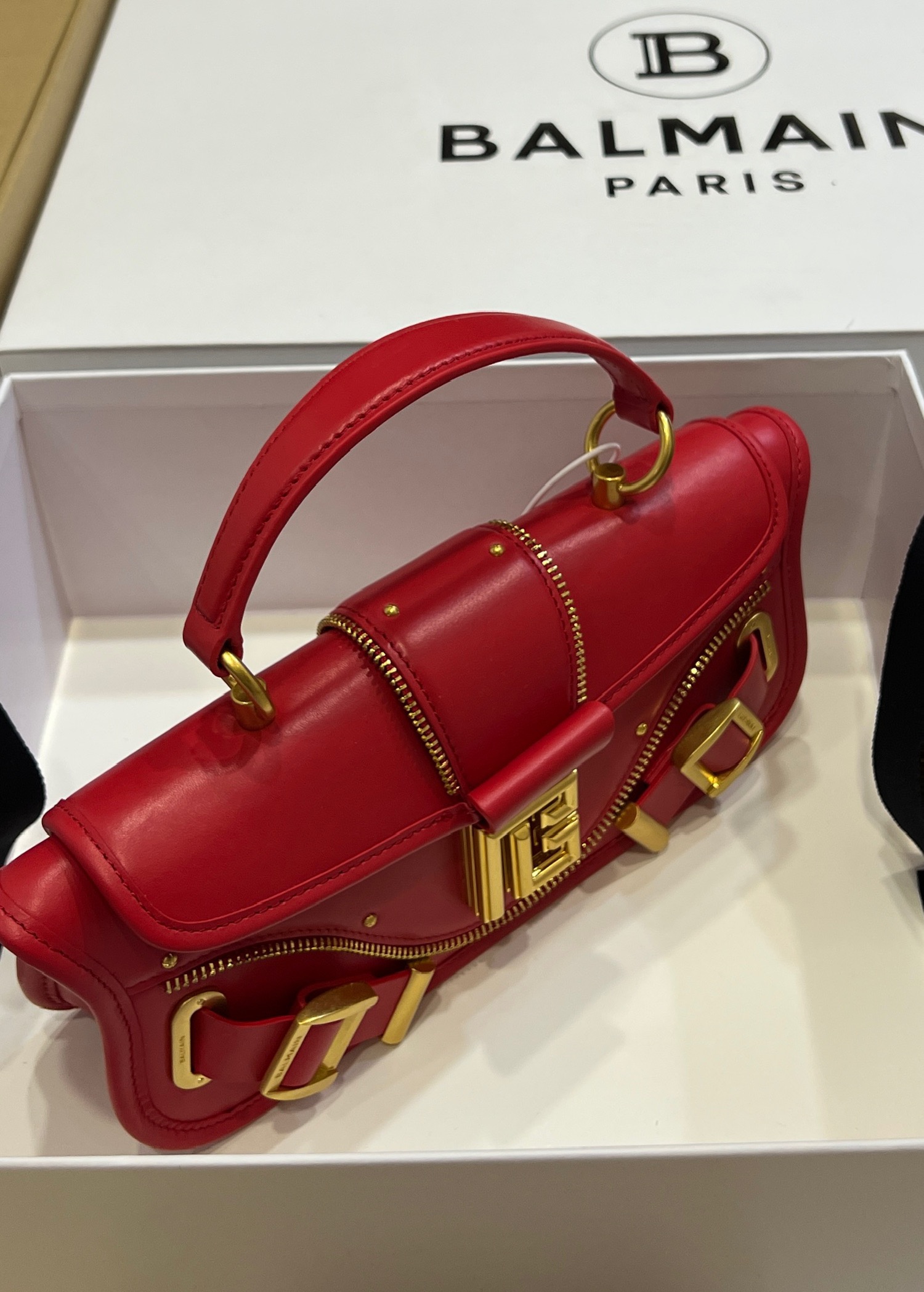 Balmain - Blaze red leather baguette bag with metal logo AN1AE795LSLX