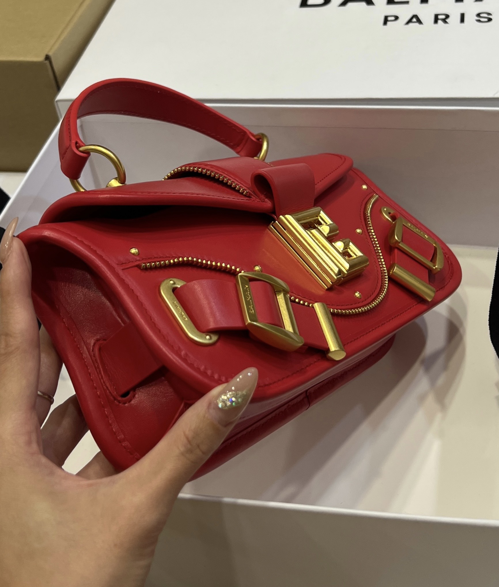 Balmain - Blaze red leather baguette bag with metal logo AN1AE795LSLX