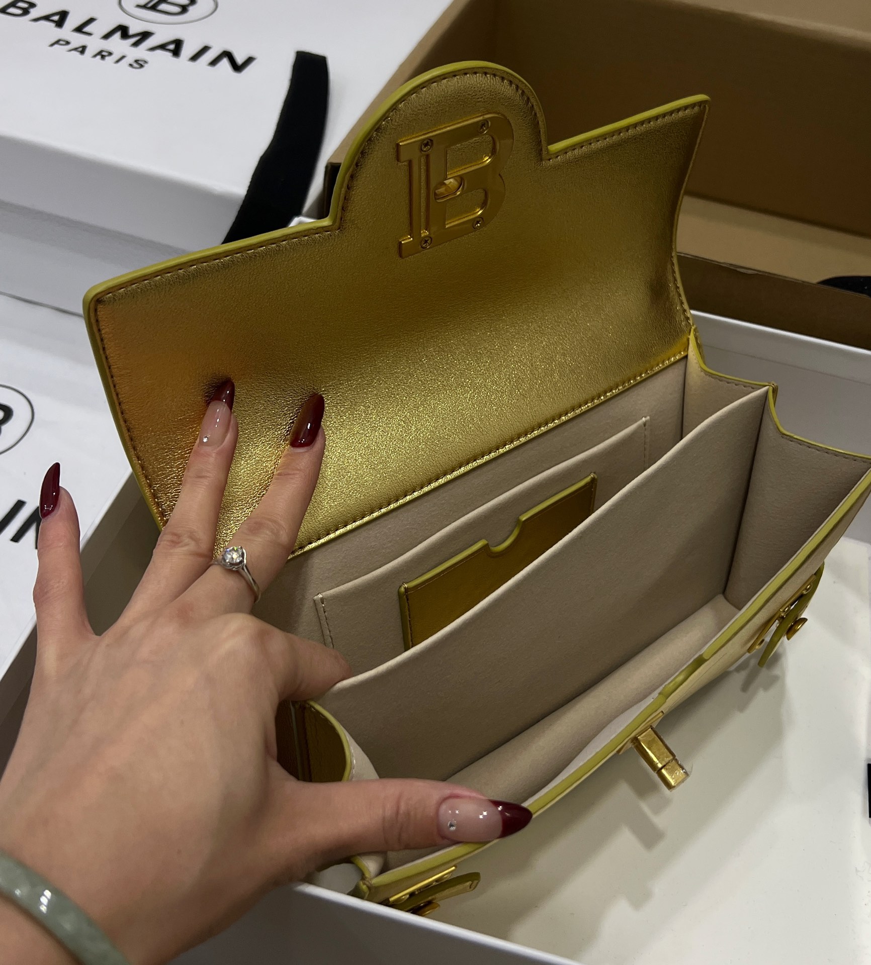 Buy Balmain Gold B-Buzz 24 Shoulder Bag in Leather For