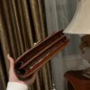 Balmain B-Buzz 24 monogrammed grained leather bag red brown