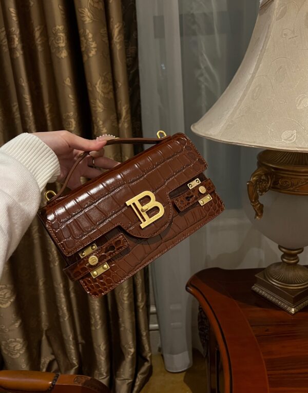 Balmain B-Buzz 24 monogrammed grained leather bag red brown