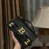 B Balmain B-Buzz 24 grained monogram leather Shoulder bag in black - Women |