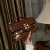 Balmain B-Buzz 24 monogrammed grained leather bag red brown