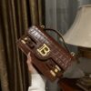 Balmain B-Buzz 24 monogrammed grained leather bag red brown