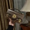 Balmain B-Buzz 24 grained monogram leather Shoulder bag brown