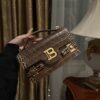 Balmain B-Buzz 24 grained monogram leather Shoulder bag brown