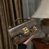 Balmain B-Buzz 24 grained monogram leather Shoulder bag brown