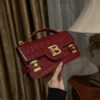 Balmain Smooth leather B-Buzz 24 bag red red - Women | BALMAIN