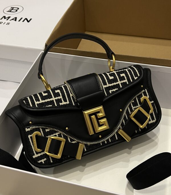 Balmain Blaze monogram-jacquard Leather Clutch Bag |