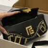 Balmain Blaze monogram-jacquard Leather Clutch Bag |