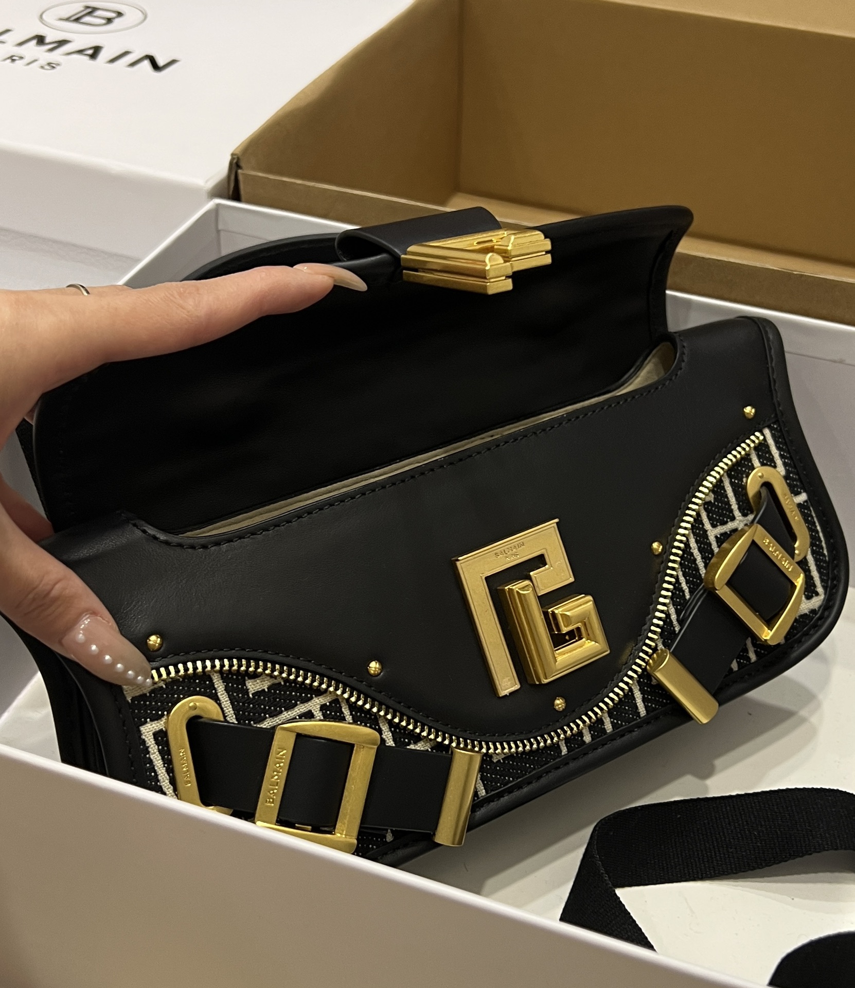 Balmain Blaze monogram-jacquard Leather Clutch Bag |