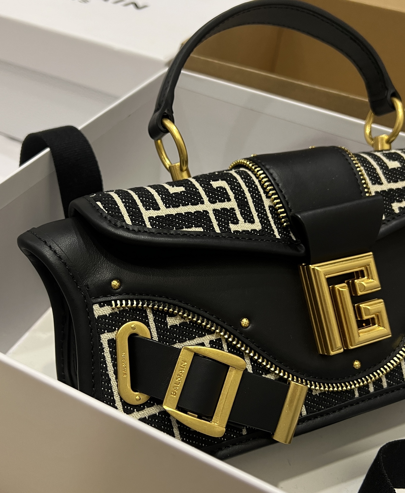 Balmain Blaze monogram-jacquard Leather Clutch Bag |
