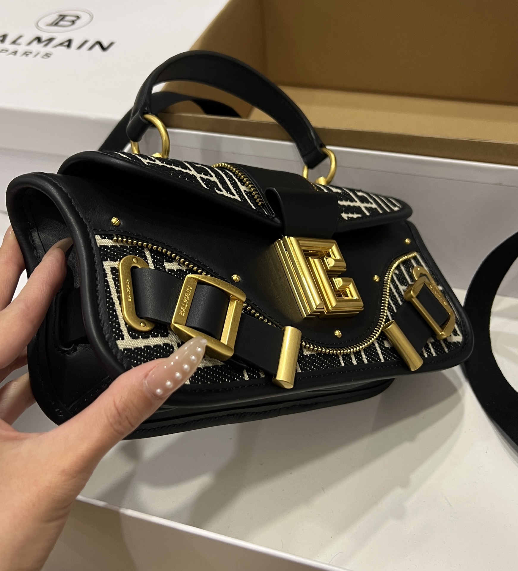 Balmain Blaze monogram-jacquard Leather Clutch Bag |