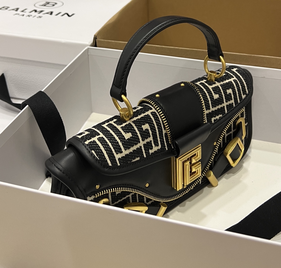 Balmain Blaze monogram-jacquard Leather Clutch Bag |