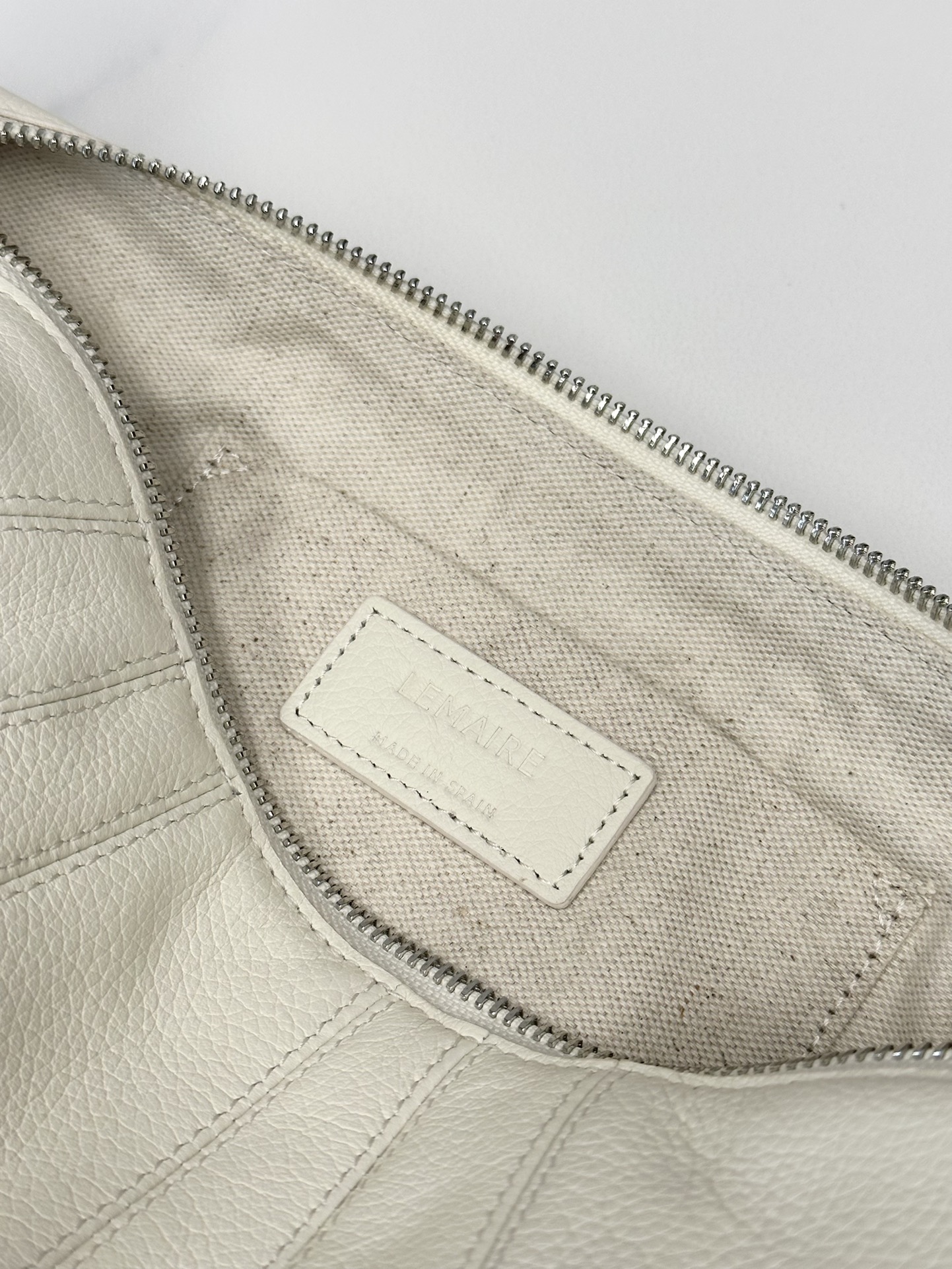 LEMAIRE Croissant Shoulder Bag | white.