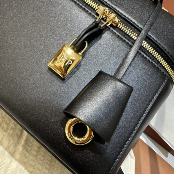 Extra L27 leather crossbody bag in black - Loro Piana |