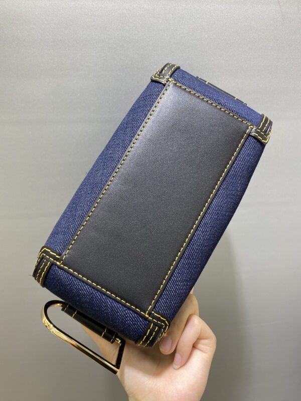 Cool Box Nano leather tote bag in blue - Delvaux