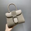 DELVAUX Grained Rodeo Calfskin Surpique Mini Brillant