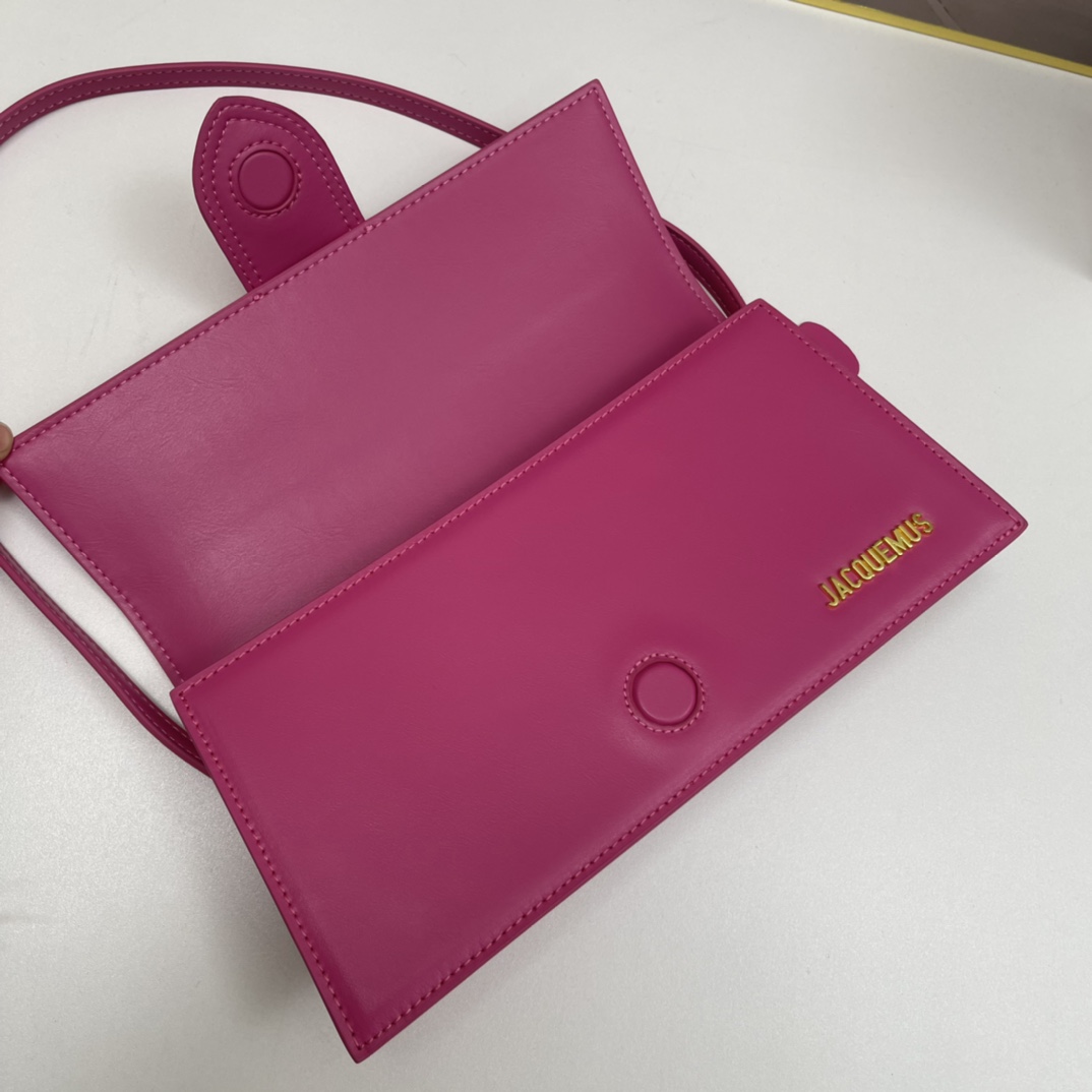 Le Bambino Jacquemus fuchsia leather shoulder bag in pink
