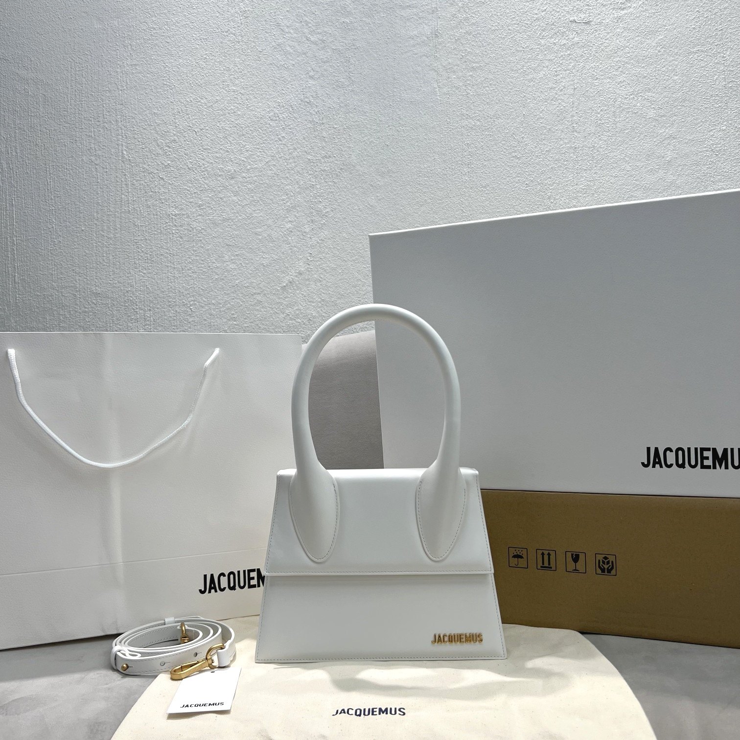 Le grand chiquito leather clutch bag Jacquemus bag in white