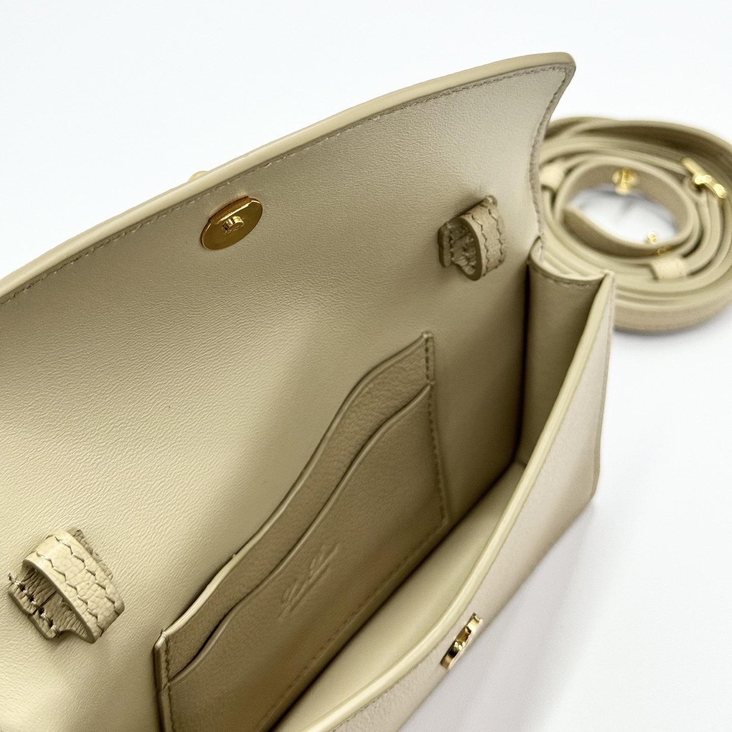 LORO PIANA Grained Calfskin Extra Pochette Light Mastic Sun