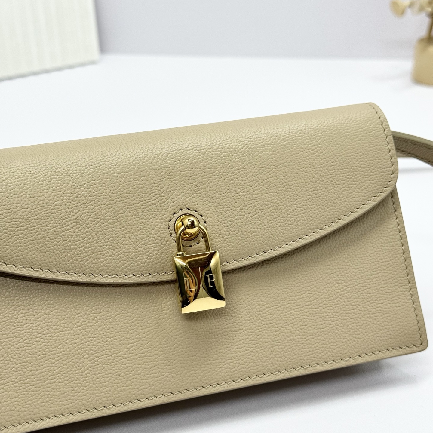 LORO PIANA Grained Calfskin Extra Pochette Light Mastic Sun