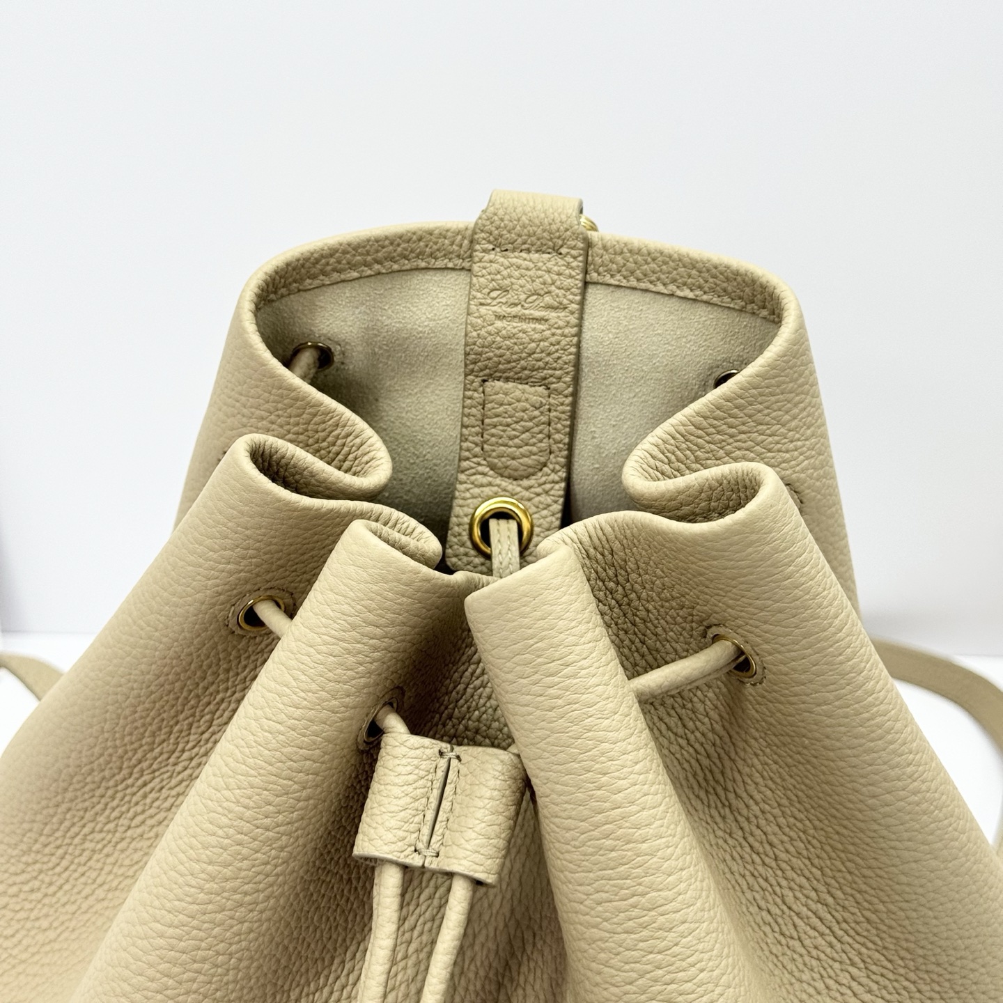 Loro Piana Extra Drawstring backpack L27 Calfskin Light Mastic/Sun Gold