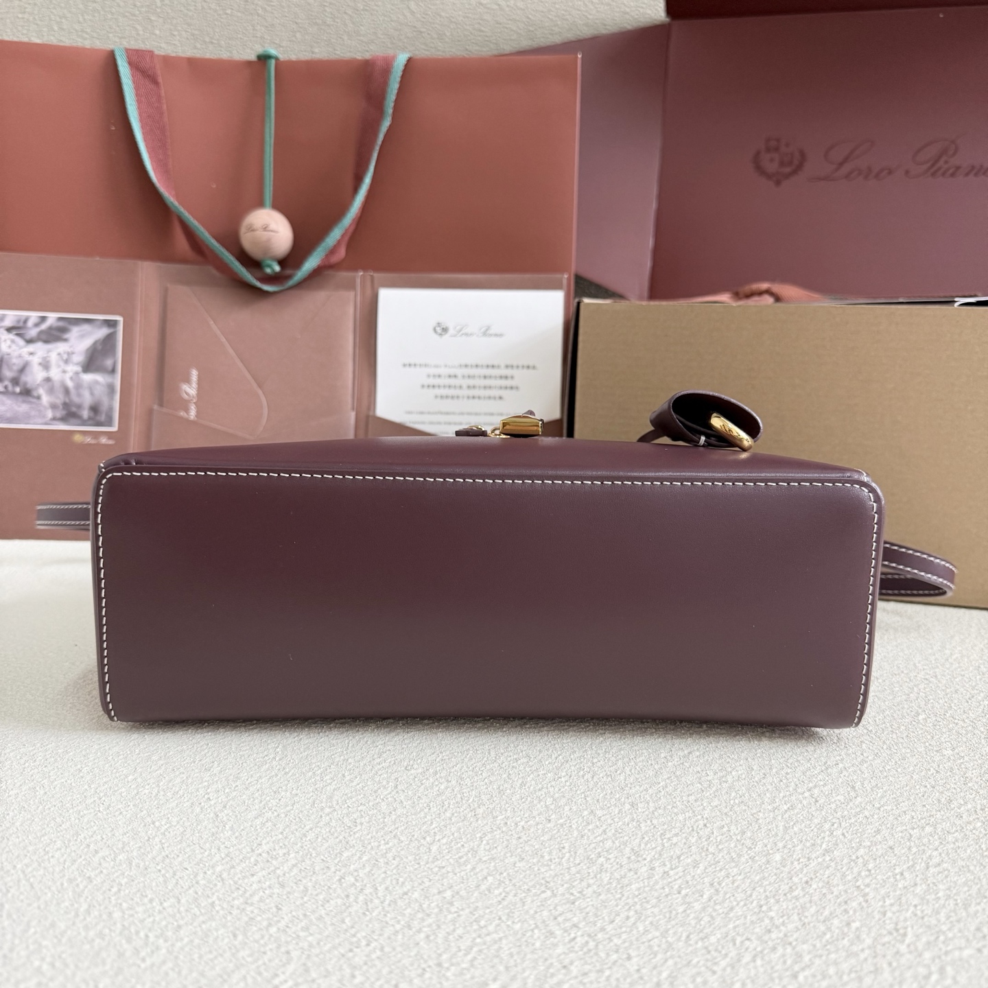 Extra bag L27 leather shoulder bag in brown - Loro Piana