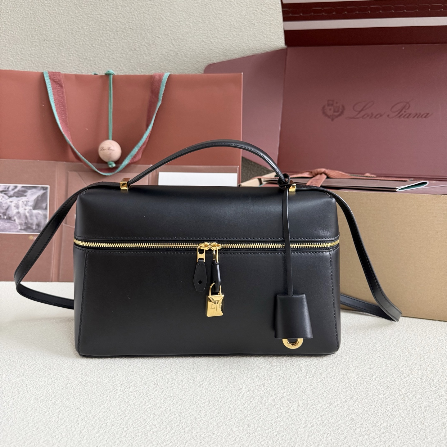 Extra L27 leather crossbody bag in black – Loro Piana |