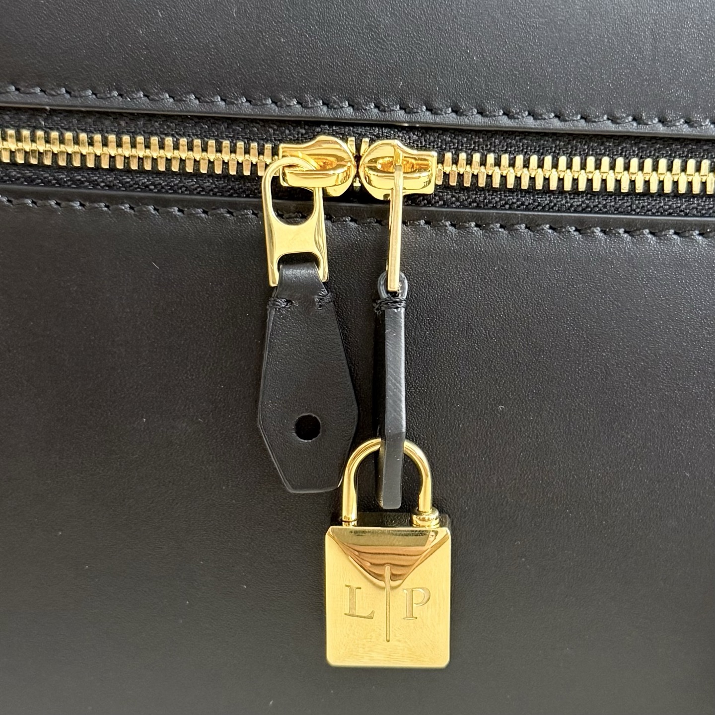 Extra L27 leather crossbody bag in black - Loro Piana |