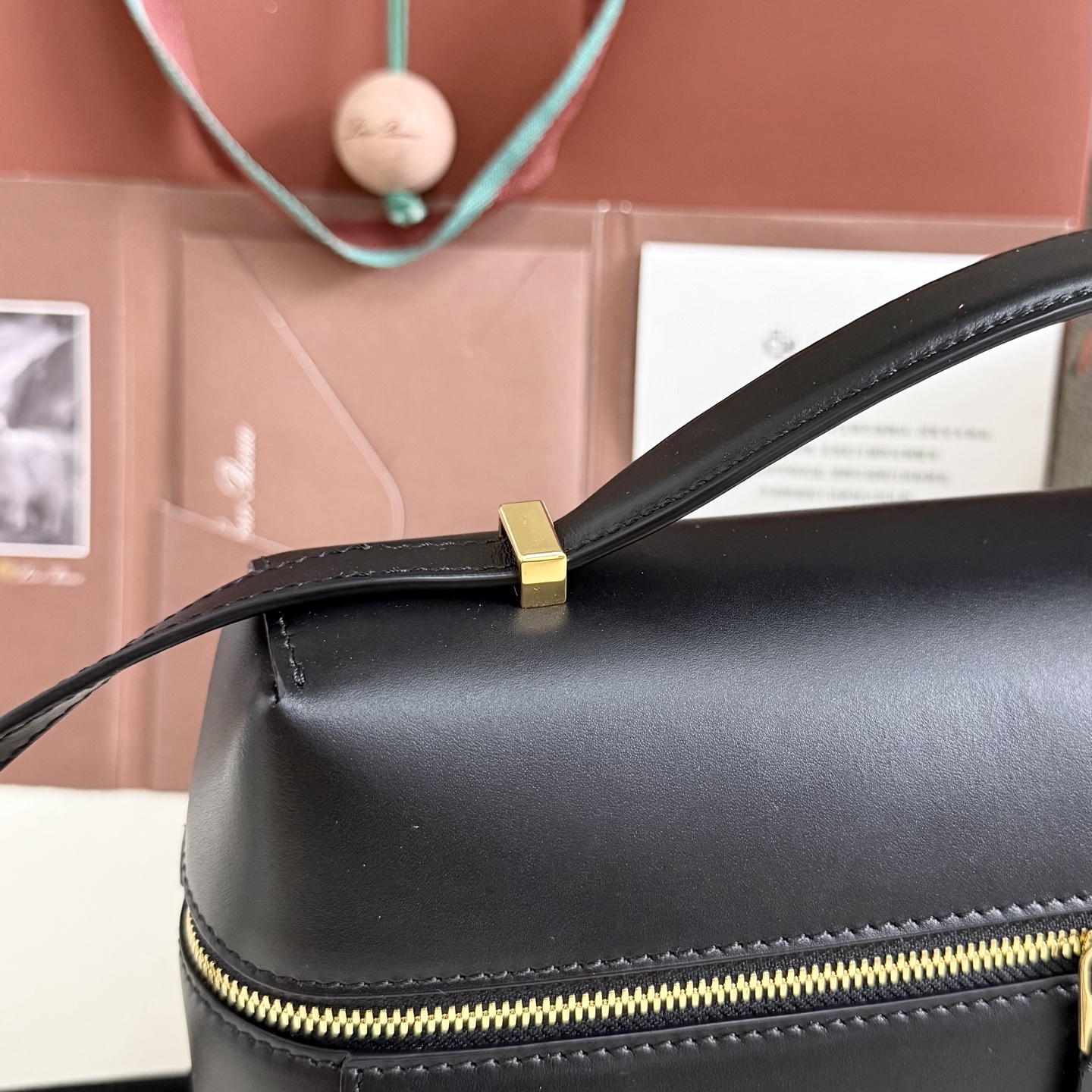 Extra L27 leather crossbody bag in black - Loro Piana |