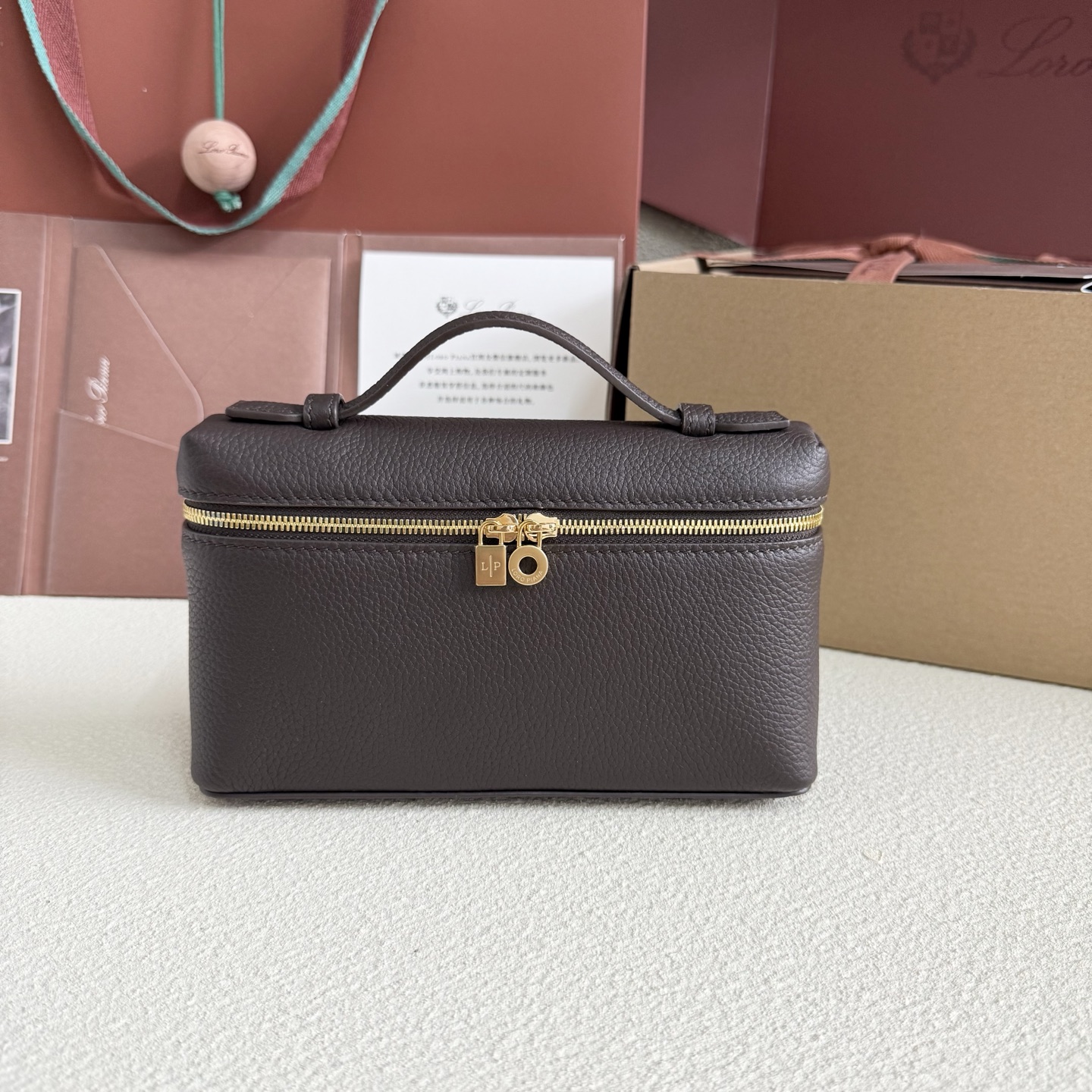Extra pocket leather handbag Loro Piana Burgundy in Leather – 56616613
