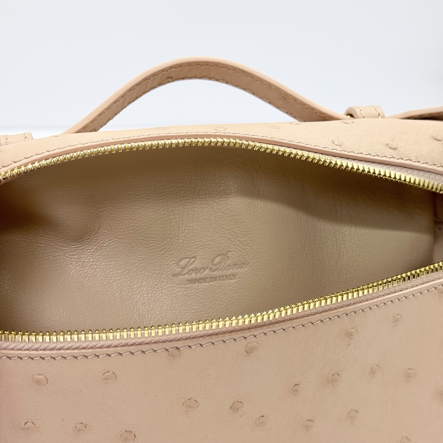 Loro Piana Extra Pocket Charm Ostrich Leather Oryx beige| Loro Piana US