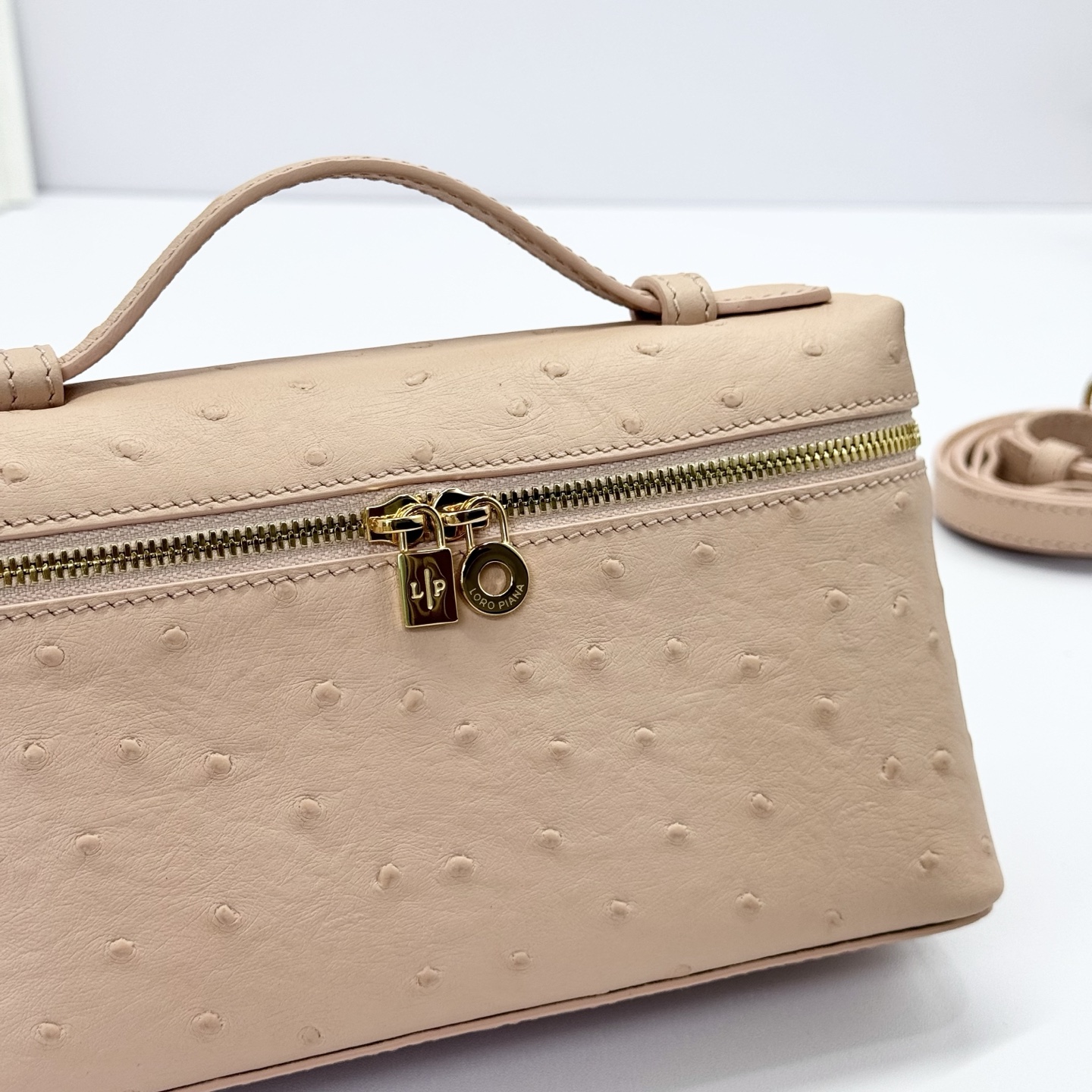 Loro Piana Extra Pocket Charm Ostrich Leather Oryx beige| Loro Piana US